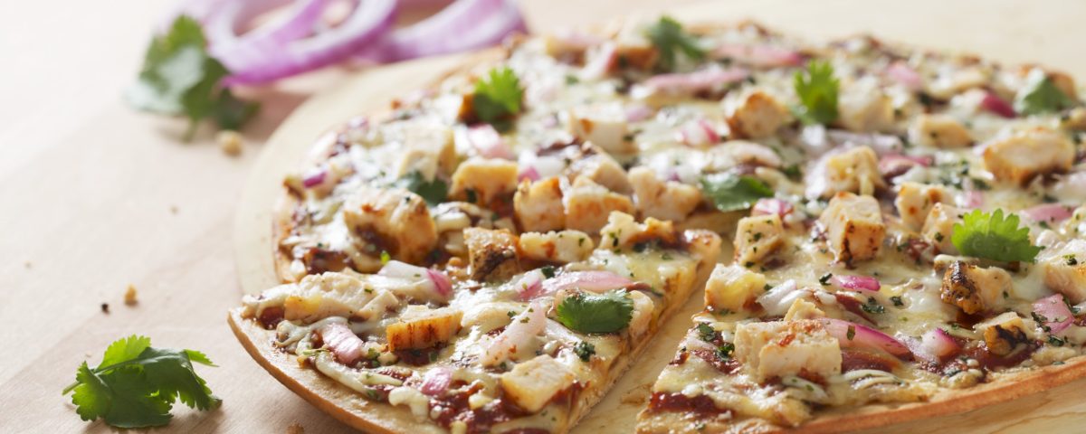 barbecue chicken pizza on table