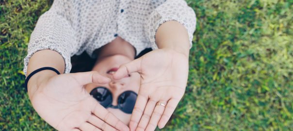 Girl Laying on Grass